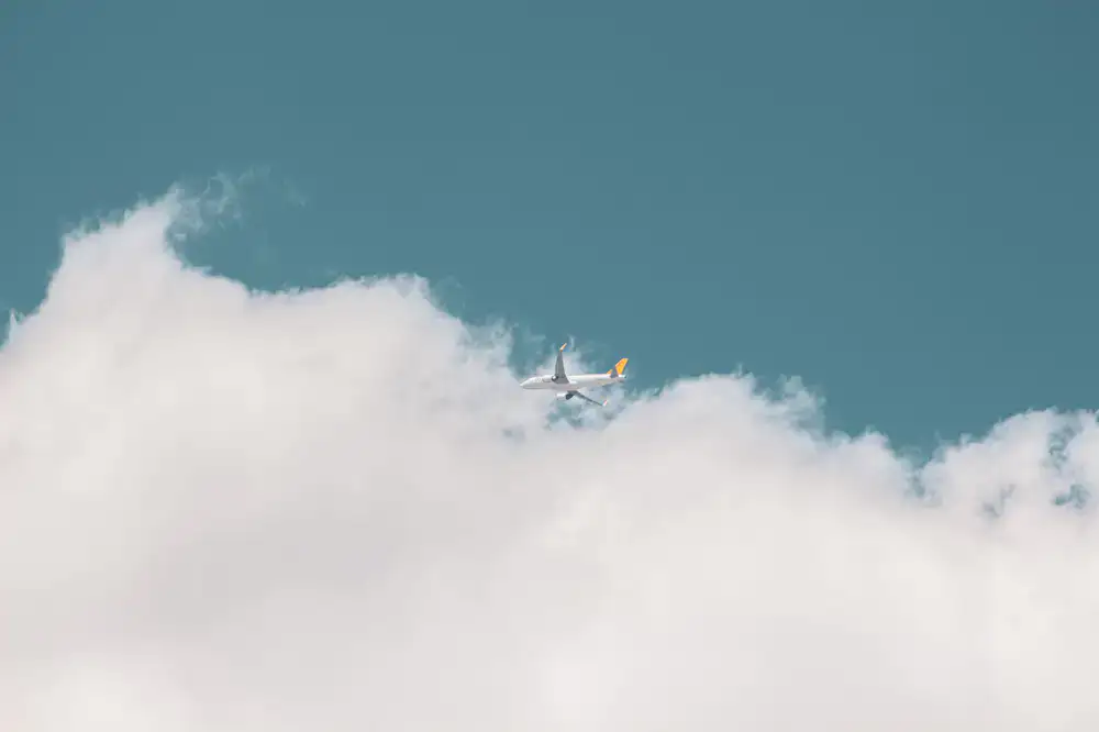 Virtual airliner cruising above the clouds